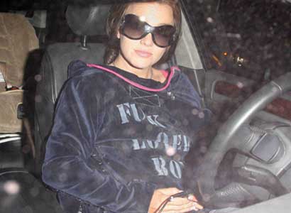 Britney Spears wears "Fuck Off Lover Boy" jacket